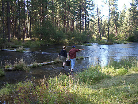 Putting the Carboy into the River to Cool